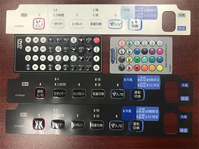 Lapisan grafis (graphic overlays) dan sakelar membran (membrane switches)